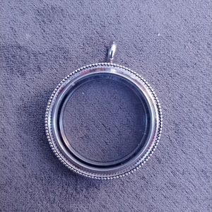 Origami owl locket pendant.